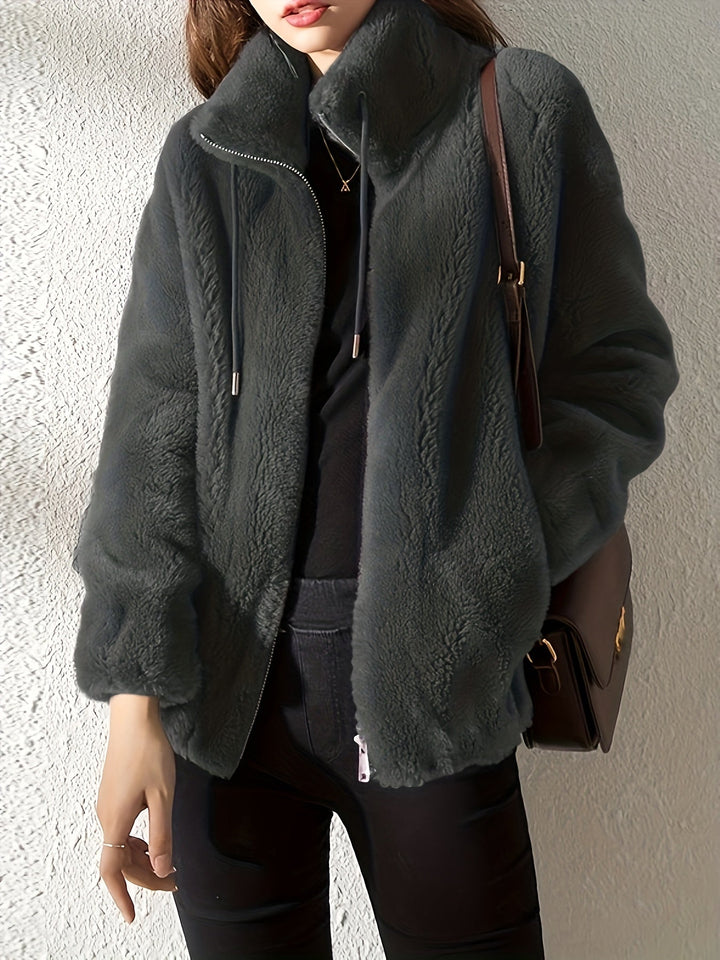 Emma & Rose Cape Town Solai comfortable khaki jacket, lightweight and stylish, shown on a model with a relaxed fit and casual design.