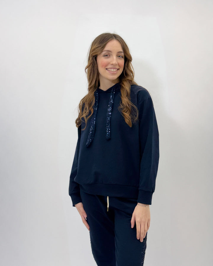 Light blue Karla sweatshirt by Emma & Rose Cape Town featuring soft fabrics and elegant sequin detailing.