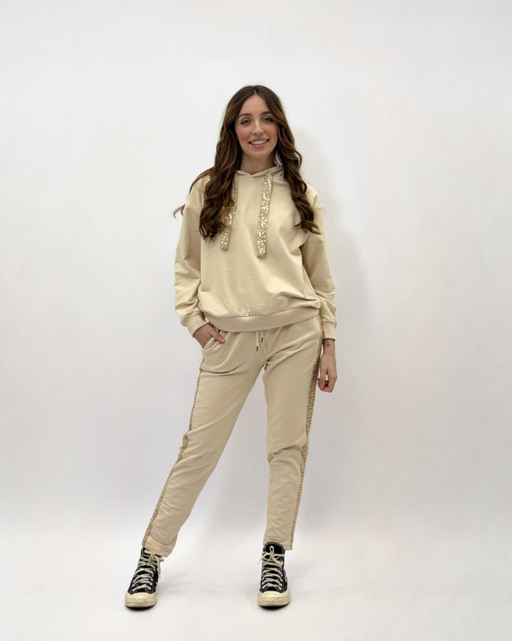 Light blue Karla sweatshirt by Emma & Rose Cape Town featuring soft, luxurious fabrics and subtle sequin accents.