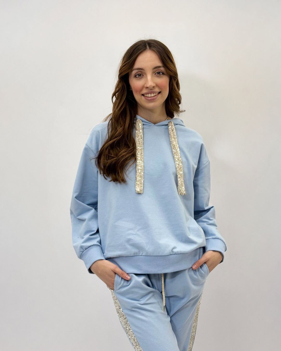 Light blue Karla sweatshirt by Emma & Rose Cape Town featuring soft luxurious fabrics and sequin accents.