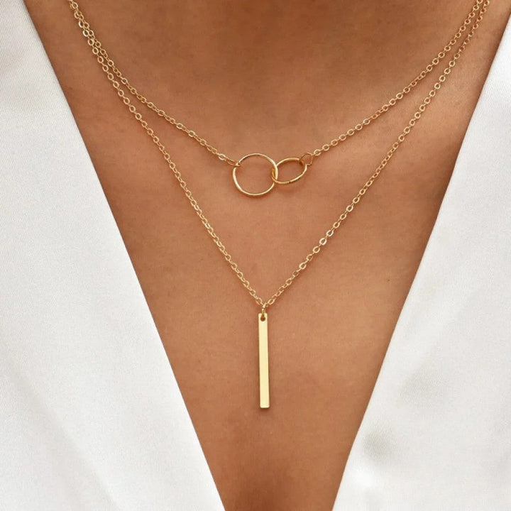 Emma & Rose Cape Town Retro™ double circle pendant necklace with layered silver circles on a delicate chain.