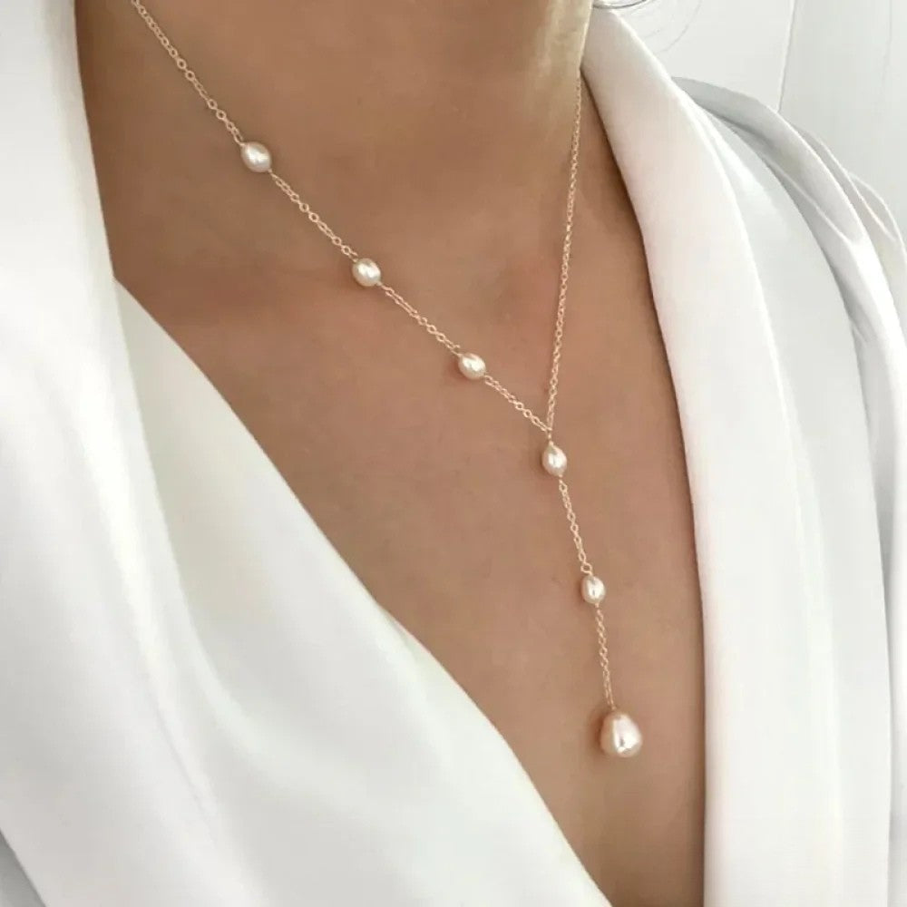Rozanne™ vintage pearl necklace pendant by Emma & Rose Cape Town, featuring a delicate pearl design on a fine chain.