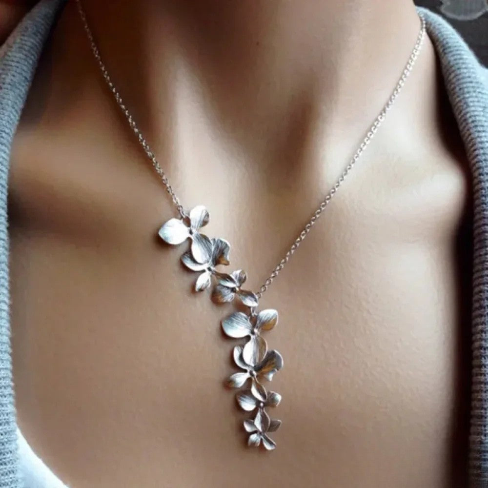 Emma & Rose Cape Town Zelda™ antique silver floral necklace featuring intricate flower pendant and delicate chain.