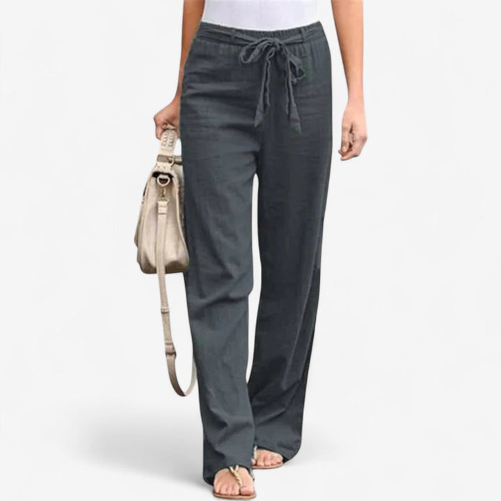 White Emma & Rose Cape Town Arislia™ Chic Trousers, stylish pants with a tailored fit, shown on a model.