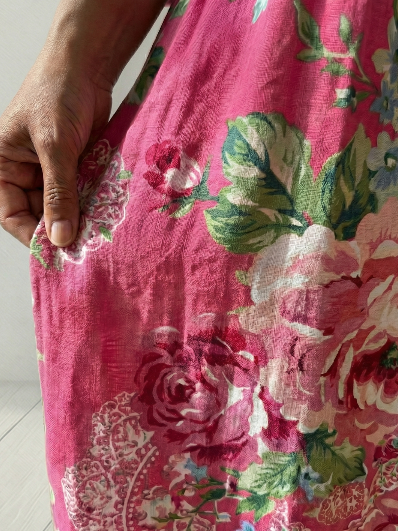 Pink Freya™ Garden Bloom Midi Dress by Emma & Rose Cape Town, featuring floral pattern and flowy fabric.