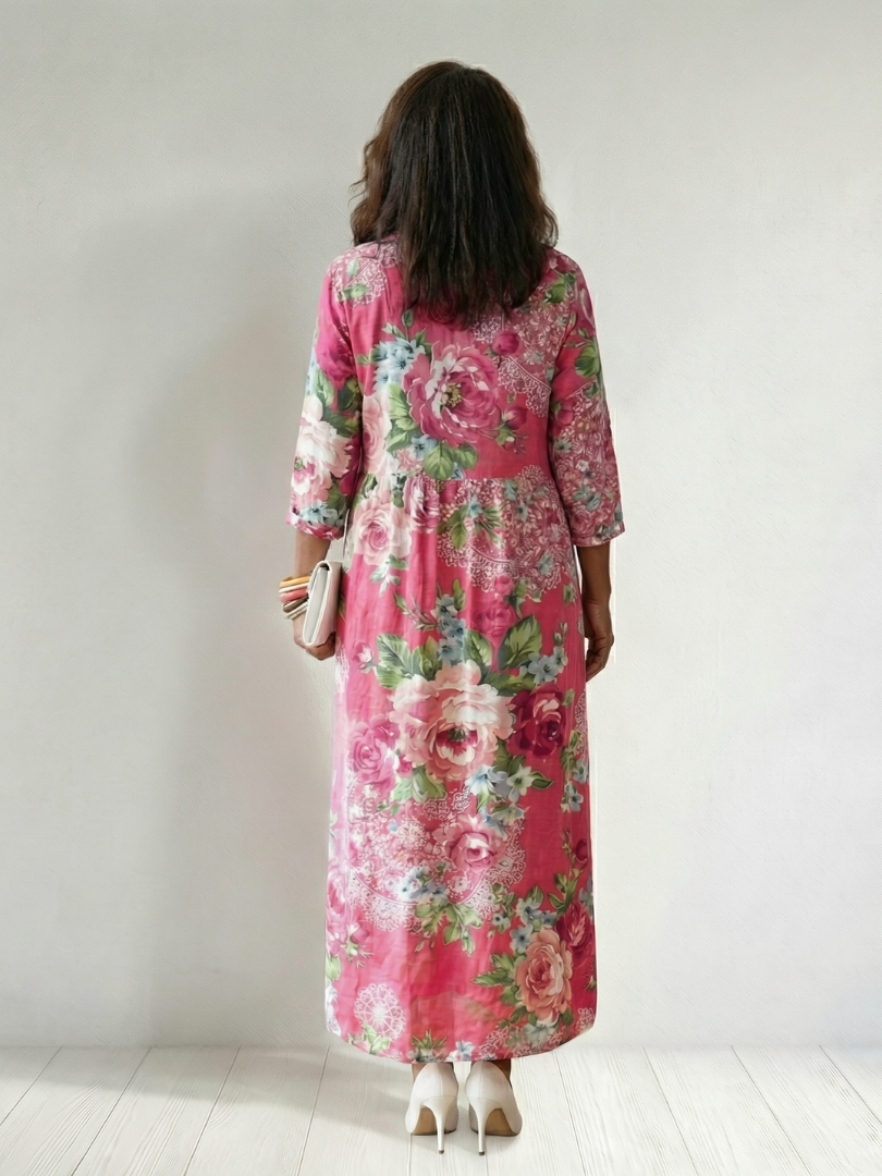 Pink Freya™ Garden Bloom Midi Dress by Emma & Rose Cape Town, featuring floral print and flowing silhouette.
