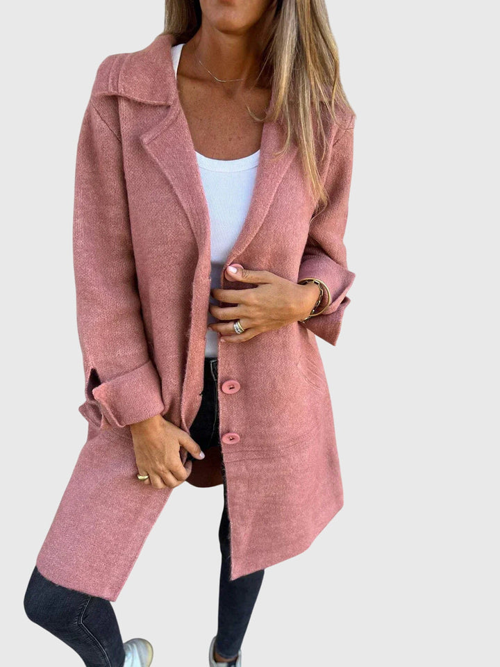 Pink blazer buttons with Emma & Rose Cape Town branding on a Lisa™ blazer, close-up of stylish metal button details.
