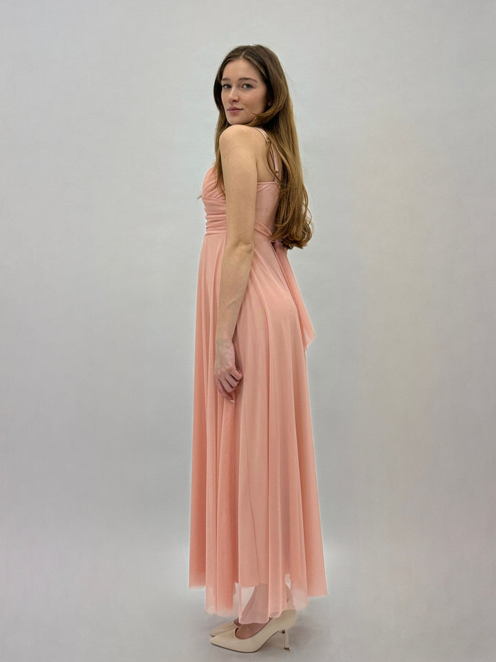 Red Allegra™ flowing dress by Emma & Rose Cape Town, showcasing lightweight fabric and elegant drape on a model.