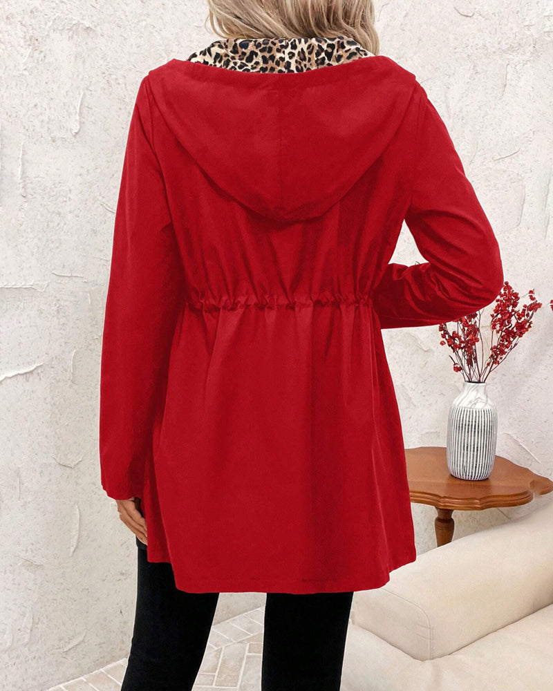 Red Amy™ elegant coat by Emma & Rose Cape Town, styled on a mannequin with detailed fabric texture and classic design.