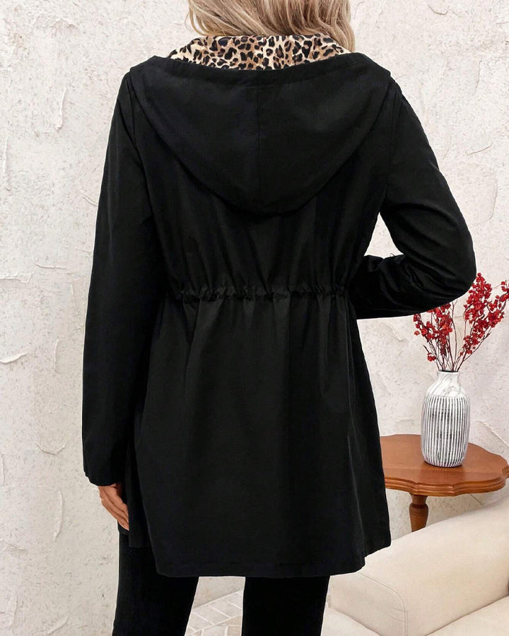 Red Amy Elegant Coat by Emma & Rose Cape Town, featuring a stylish tailored design with a classic collar and button closure.
