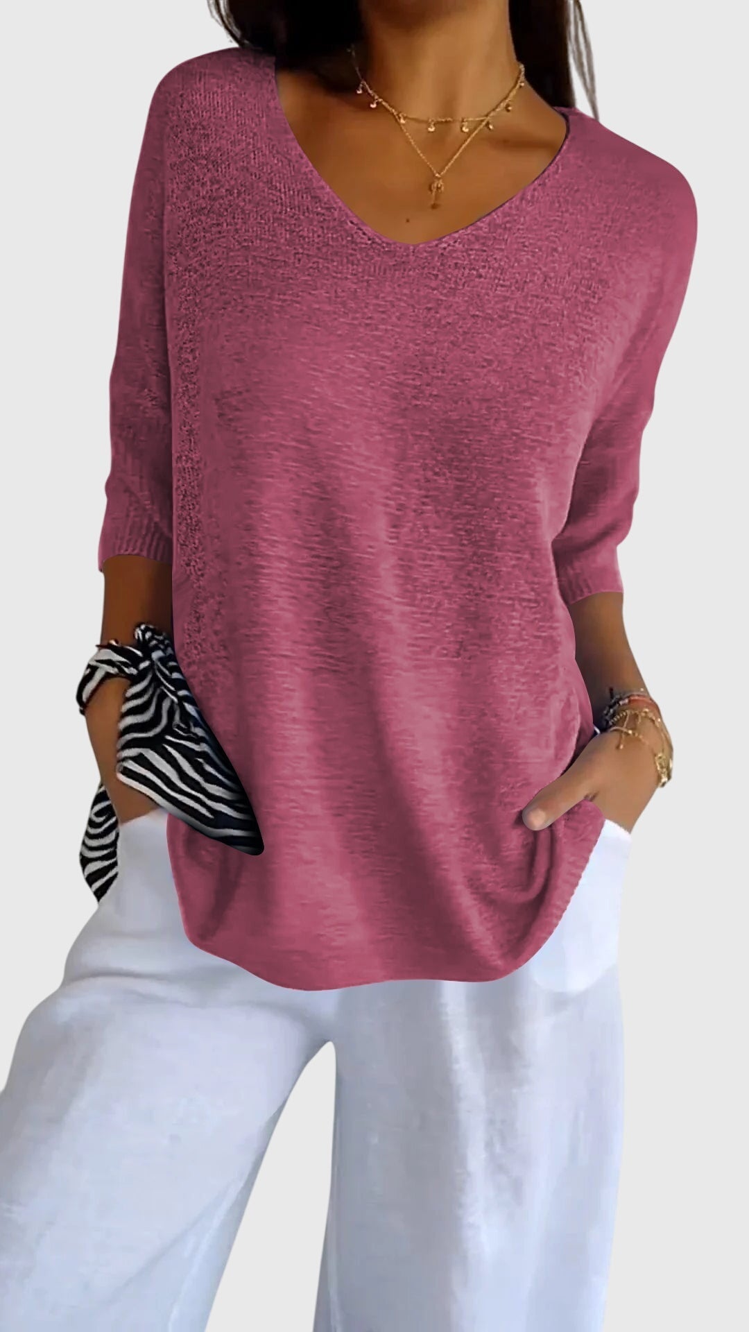 Emma & Rose Cape Town Cassandra V-neck top in red, showcasing an elegant, fitted design with short sleeves.