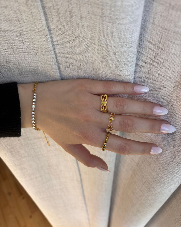 Emma & Rose Cape Town Melianora 18k gold ring, delicate design with polished finish, showcasing fine craftsmanship.