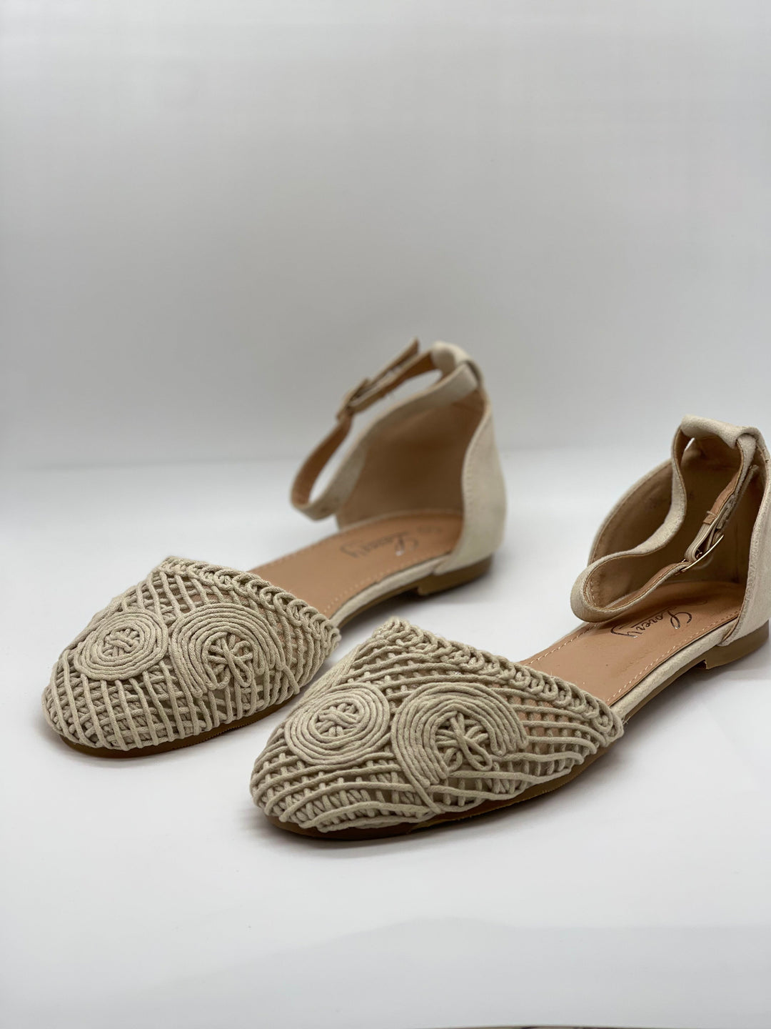 Beige Romy™ flat sandals by Emma & Rose Cape Town with soft, luxurious fabrics and comfortable slip-on design.
