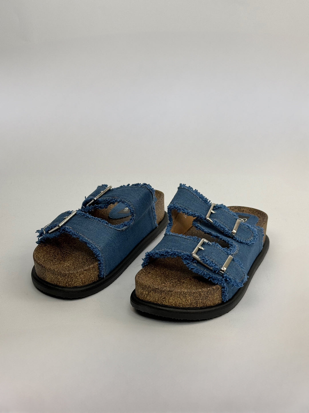 Emma & Rose Cape Town High™ sandals in light denim with soft, luxurious fabrics and stylish Murano glass accents.