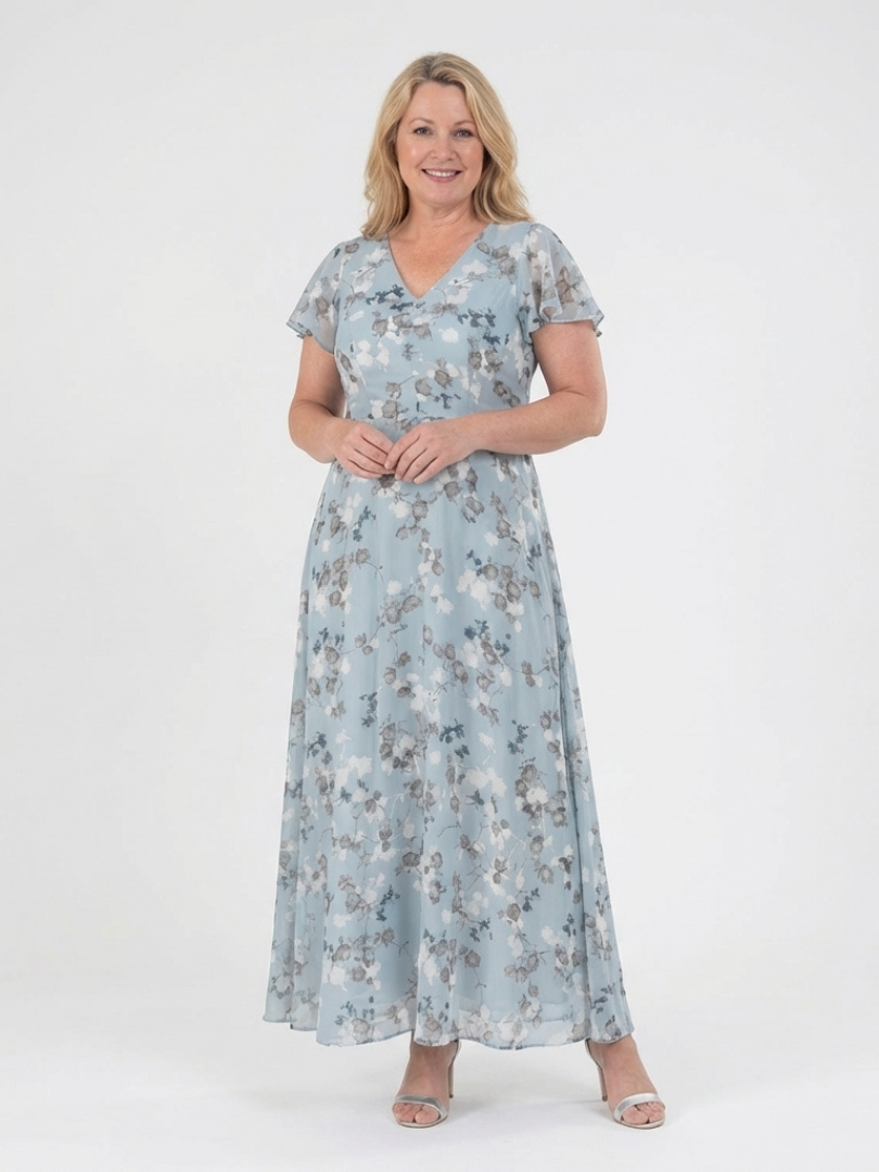 Sky blue Ismeria floral flowing maxi dress by Emma & Rose Cape Town, featuring lightweight fabric and vibrant floral pattern.