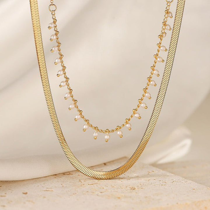 Marizanne™ Pearl Jewellery Set by Emma & Rose Cape Town featuring elegant pearl earrings and necklace in a coordinated design