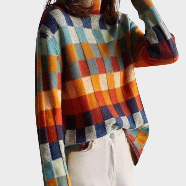 Débora™ knitted sweater by Emma & Rose Cape Town, featuring a cozy, stylish design in soft fabric, shown in the image.