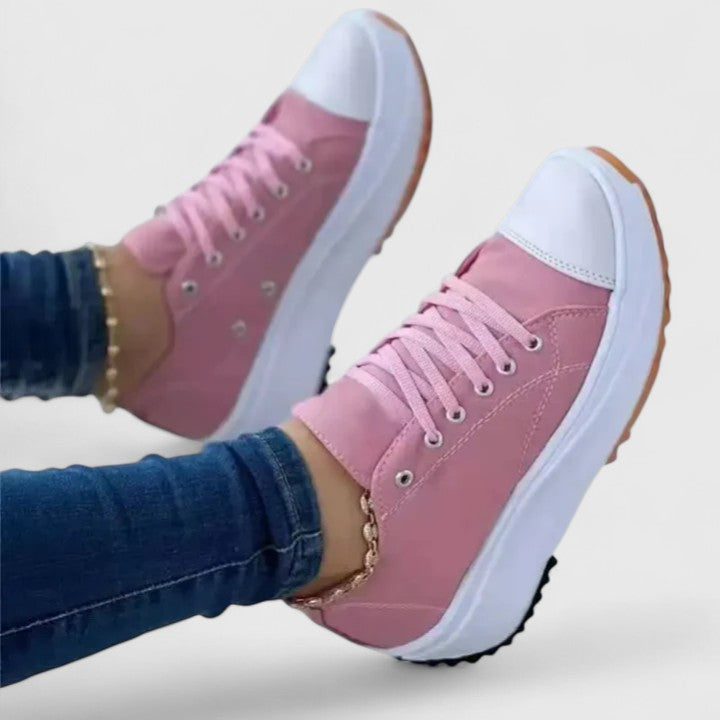 White Kelly™ comfortable sneakers by Emma & Rose Cape Town, featuring a casual design with laces and a cushioned sole.