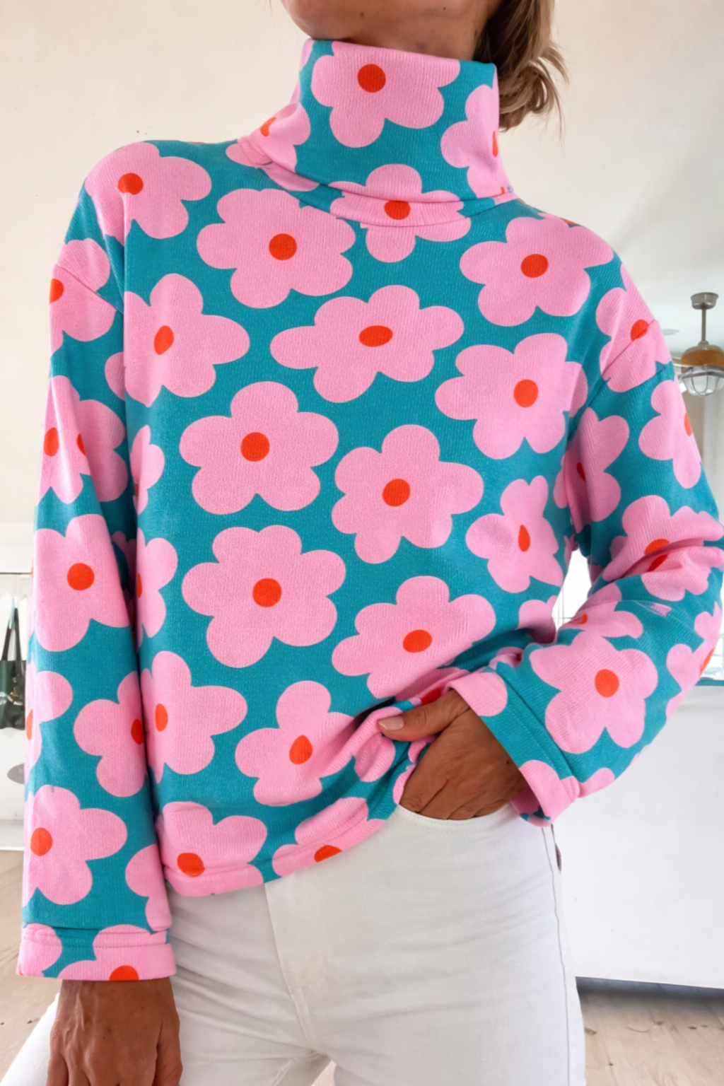 Emma & Rose Cape Town Gunilla floral high collar sweater with intricate floral pattern and cozy knit fabric.