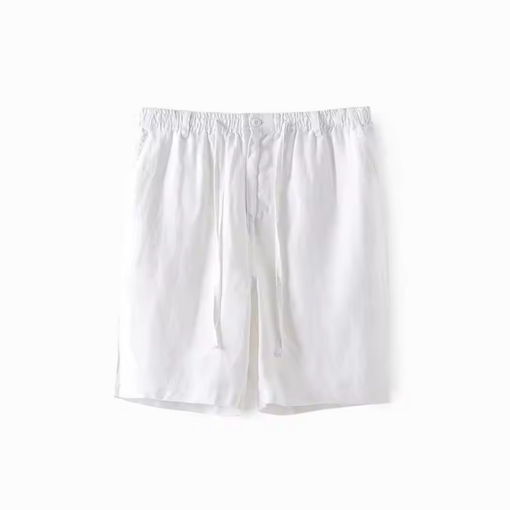 Beige Nico™ Fez Shorts by Emma & Rose Manhattan, featuring a relaxed fit and casual style, shown on a model.