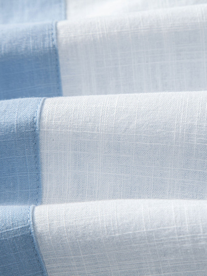 Light blue Torsten™ short-sleeved two-piece outfit by Emma & Rose Manhattan, featuring a stylish and comfortable set for women.