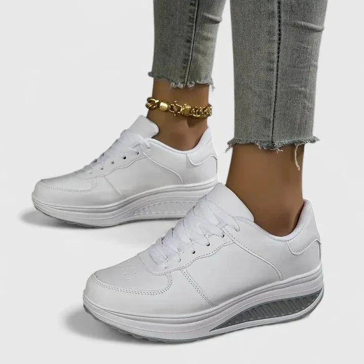 Carmeliyah™ orthopaedic sneakers by Emma & Rose Cape Town, beige and white sneakers with supportive design and cushioned soles.