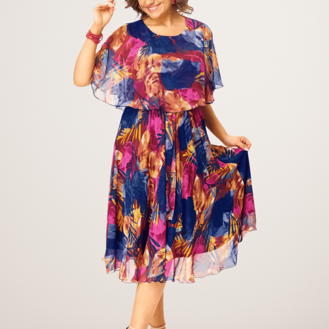 Plus size flowing dress from Emma & Rose Manhattan's Barbara collection, featuring soft fabric and elegant design.