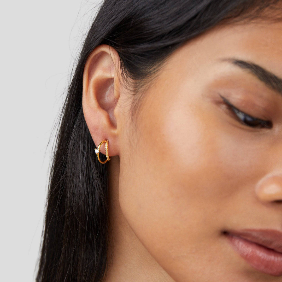 Jenny™ Elegant Crystal Earrings by Emma & Rose Cape Town featuring layered crystal design with gold hoop accents.