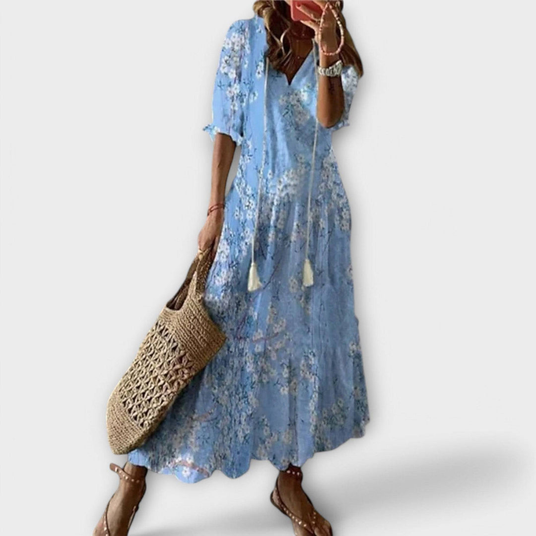 Light blue Savannah™ elegant maxi dress by Emma & Rose Cape Town, flowing fabric and stylish design.